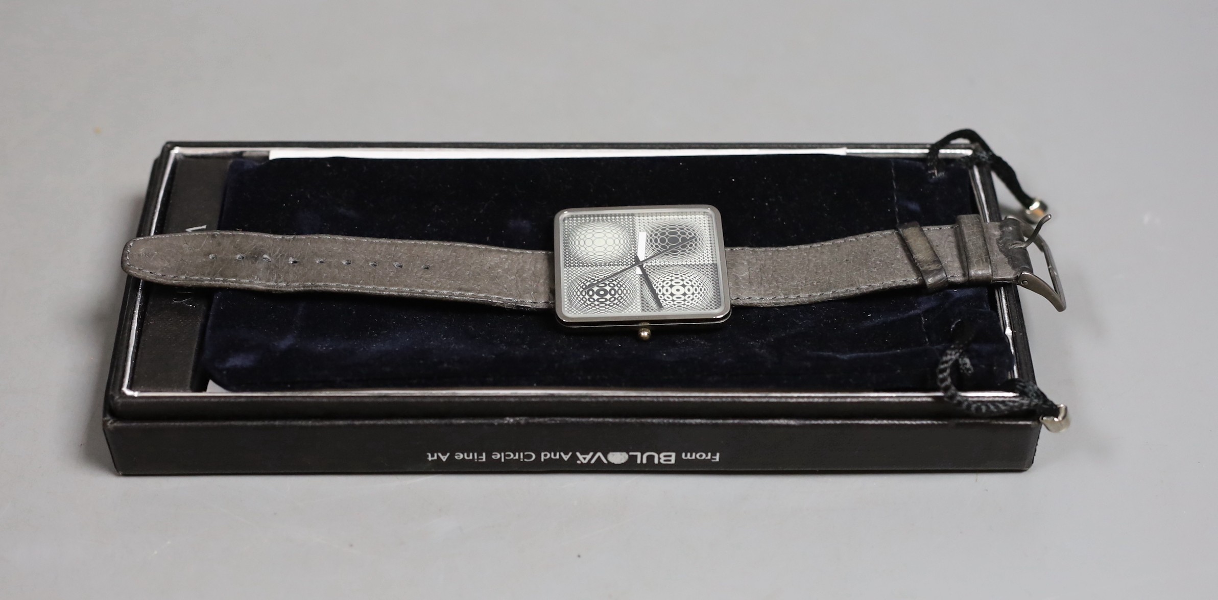 A modern Victor Vasarely for Bulova, Op Art 'Four Squares' quartz wrist watch, with box and papers.